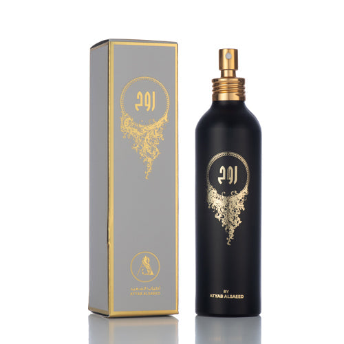 صورة لزجاجة مرش كويتي روح سوداء مطعمة باللون الذهبي مع علبة سوداء أنيقة، تُبرز الفخامة والتصميم الراقي للمنتج.	