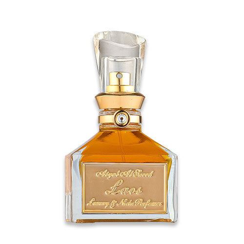 صورة لزجاجة عطر دهن العود لاوس النحاسية اللون في زجاجة شفافة مربعة الشكل مع لمسات ذهبية، تُبرز الفخامة والأناقة في التصميم.	